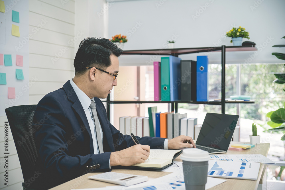 businessman work on office desk. businessman work on office desk.