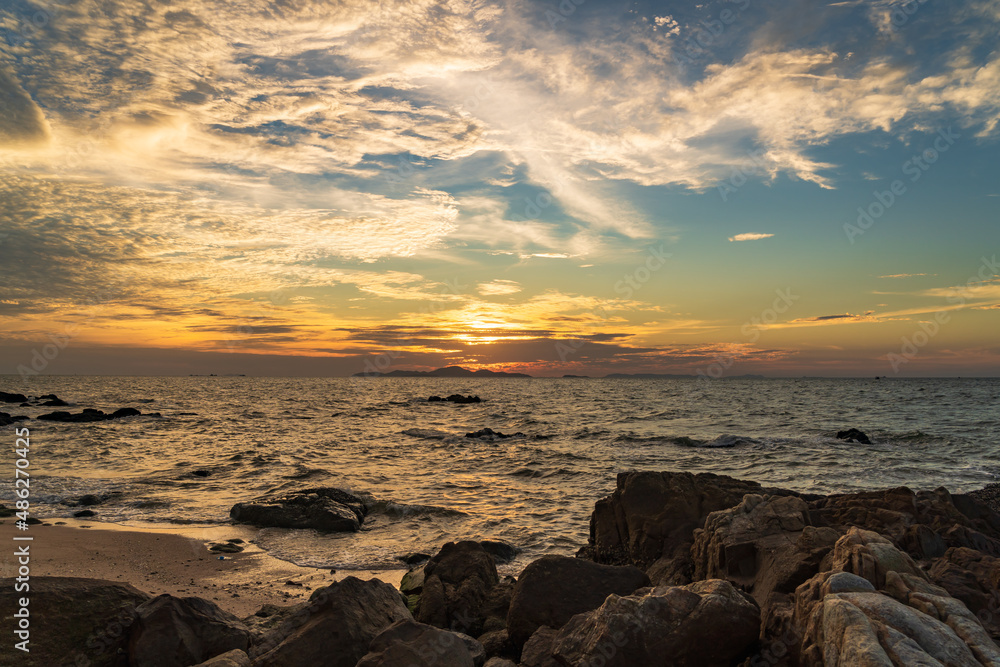 Beautiful cloudscape over the sea, sunset landscape shot, orange sunset 