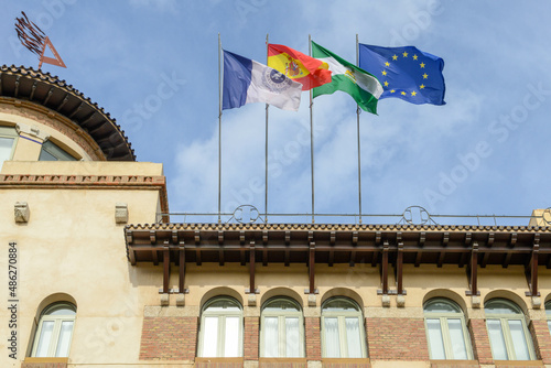 Flags on the university of Malaga in Spain