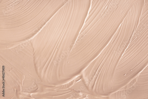 Fotografie A smear of foundation as a background