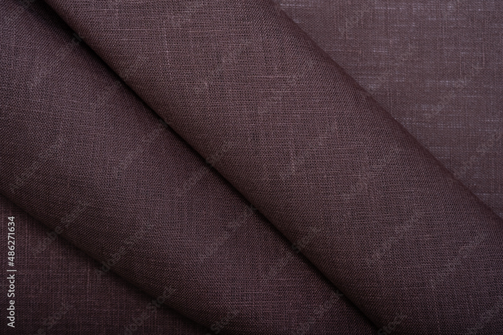 Natural linen fabric texture. Textured fabric background. Concept of using natural eco-friendly materials Natural linen fabric texture. Textured fabric background. Concept of using natural eco-friendly materials