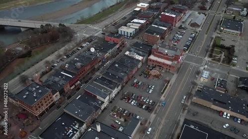 Aerial View of Corning NY USA. Downtown Street Traffic and Rockwell Museum Building in Twilight, Drone Shot photo