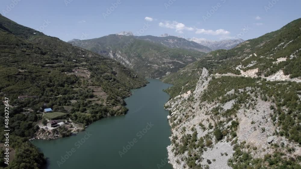 Frontal Drone video of the Drin River at Valbona Pass in Kukes County. With the towns on the sides and their houses. Frontal Drone video of the Drin River at Valbona Pass in Kukes County. With the towns on the sides and their houses.