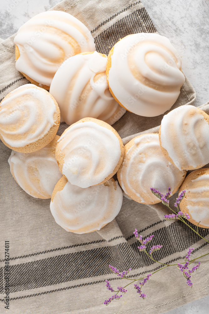 Portuguese sweets cavacas on napkin in a table. Typical cookies with sugar Portuguese sweets cavacas on napkin in a table. Typical cookies with sugar