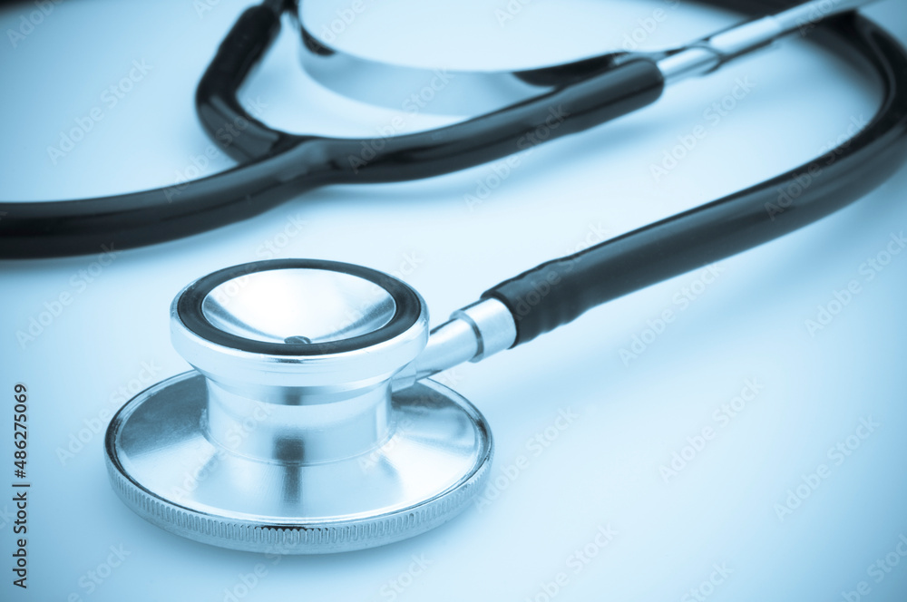 Medical Stethoscope on White background with Blue Toning Medical Stethoscope on White background with Blue Toning
