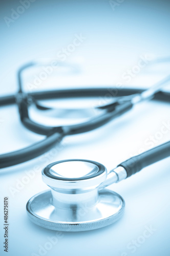 Medical Stethoscope on White background with Blue Toning