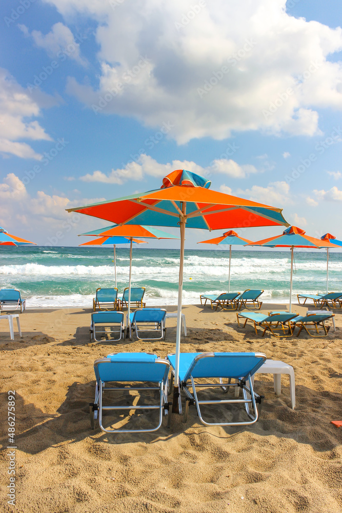 Bright beach umbrellas on the tropical coast
