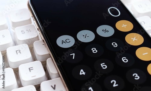 Calculator app on smartphone screen © Sai