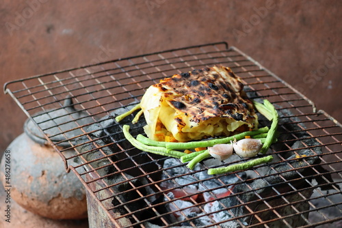 Cambodia. Grill near the road. In the province of Battambang, you can find rice rats that are grilled and also sold. Battambang province. photo