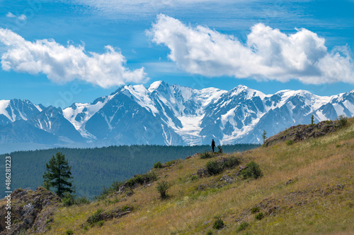 traveler on the background of a mountain in Altai