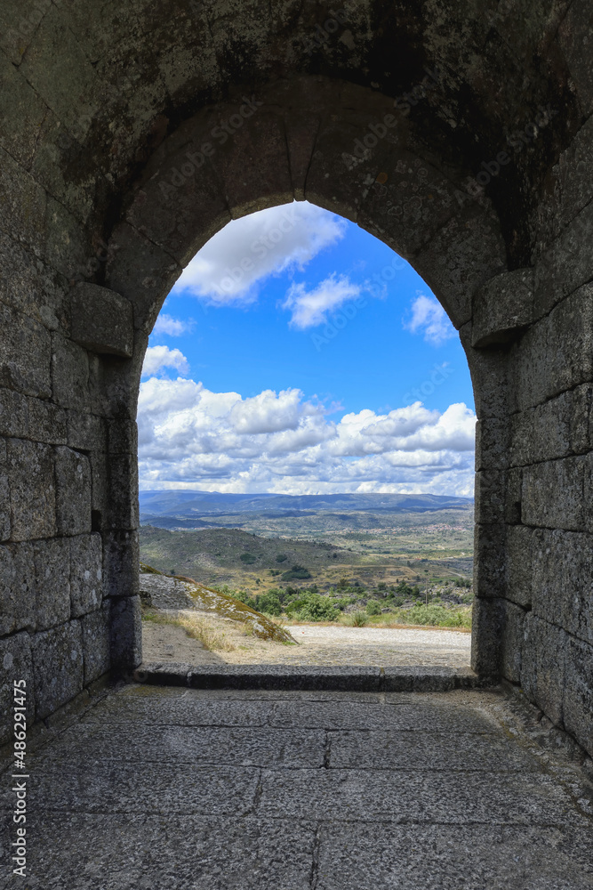 Landscape around Sortelha viewed through an entrance gate, Serra da Estrela, Beira Alta, Portugal