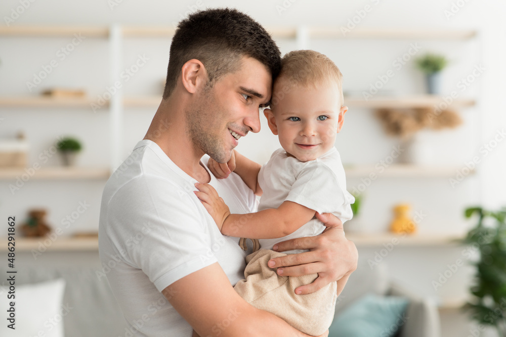 Obraz premium Father's Love. Happy Millennial Daddy Bonding With Cute Infant Son At Home