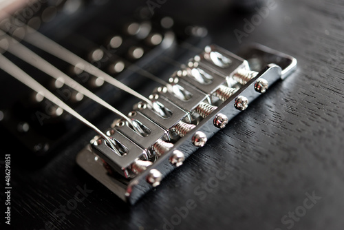 close up of a guitar, blurred focus