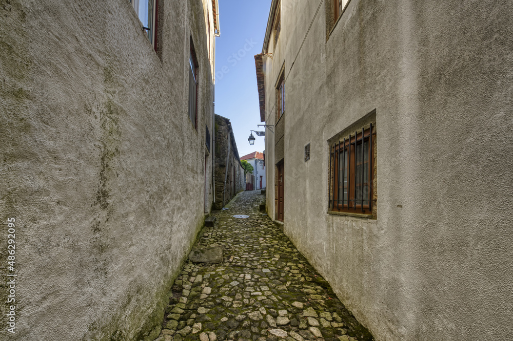 Narrow cobble street and old stone houses, Trancoso, Serra da Estrela, Portugal
