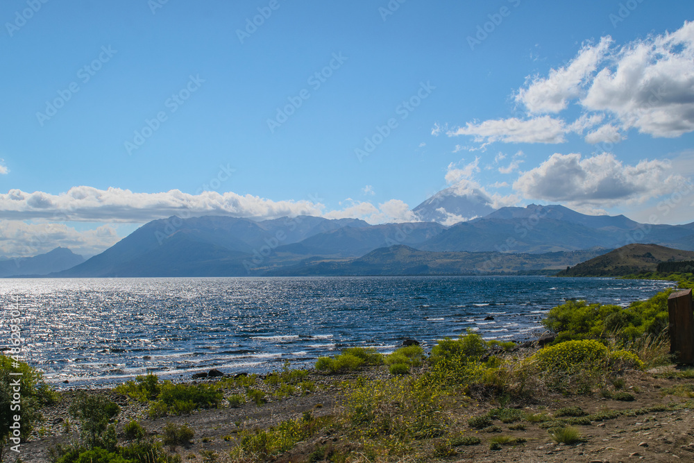 The Huechulafquen lake in the Argentinian Andes, mountain range in the background.