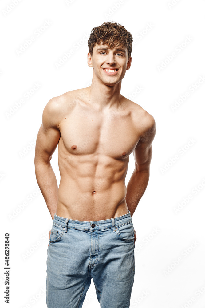 Portrait of sexy man in jeans isolated on white background Portrait of sexy man in jeans isolated on white background