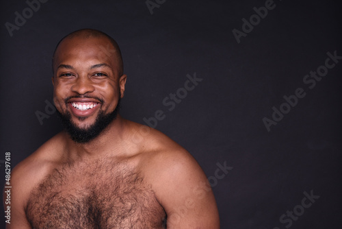 Studio portrait of shirtless young man