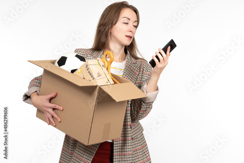 Woman holding cardbox. Girl...