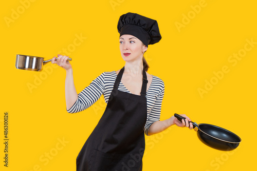 Cook with frying pan and sa...