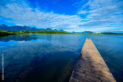 Fototapeta Naklejka Na Ścianę i Meble -  Lake Hopfensee near Fuessen - View of Allgaeu Alps, Bavaria, Germany - paradise travel destination