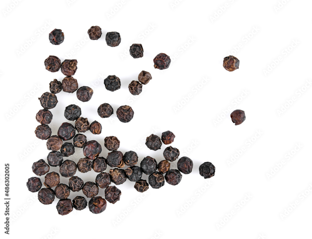 Black pepper corns Scattered on white background Black pepper corns Scattered on white background