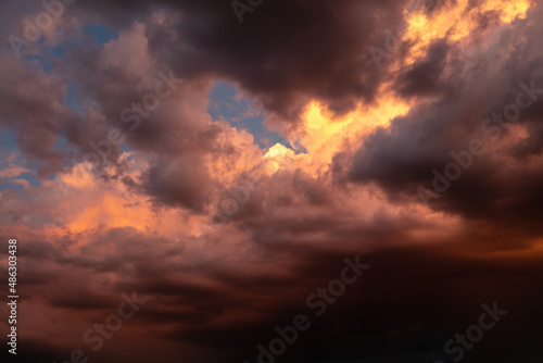 Dramatic thunder clouds with red  and blue