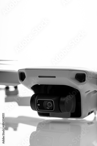 Gray drone isolated on a white background, small drone close-up,