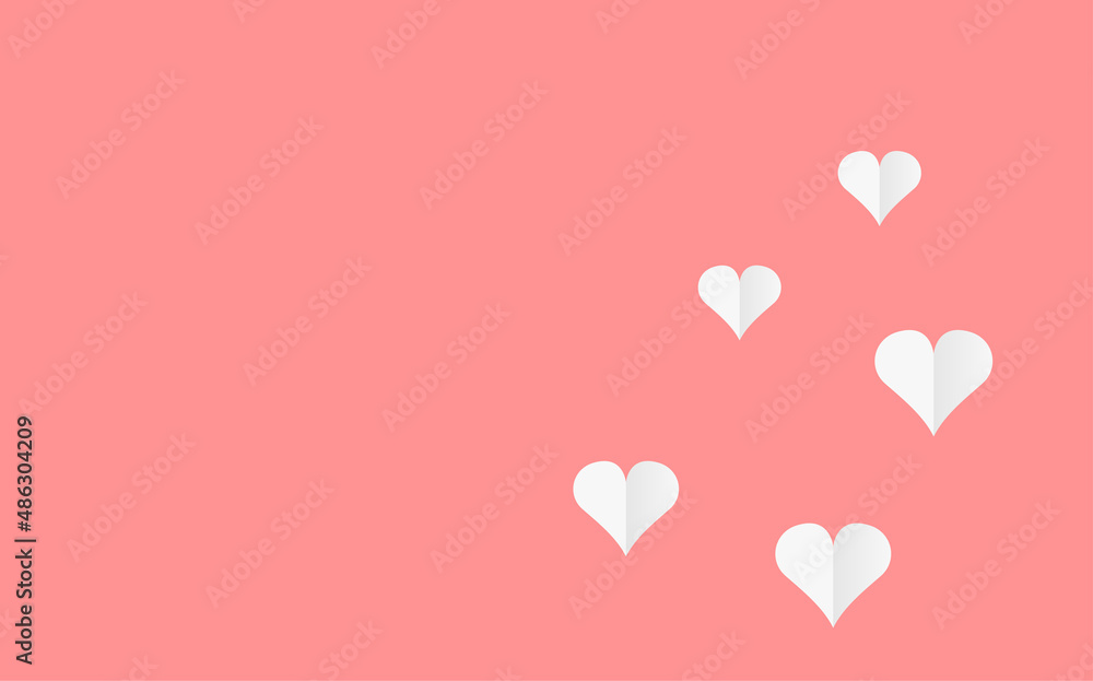 paper hearts on pink background