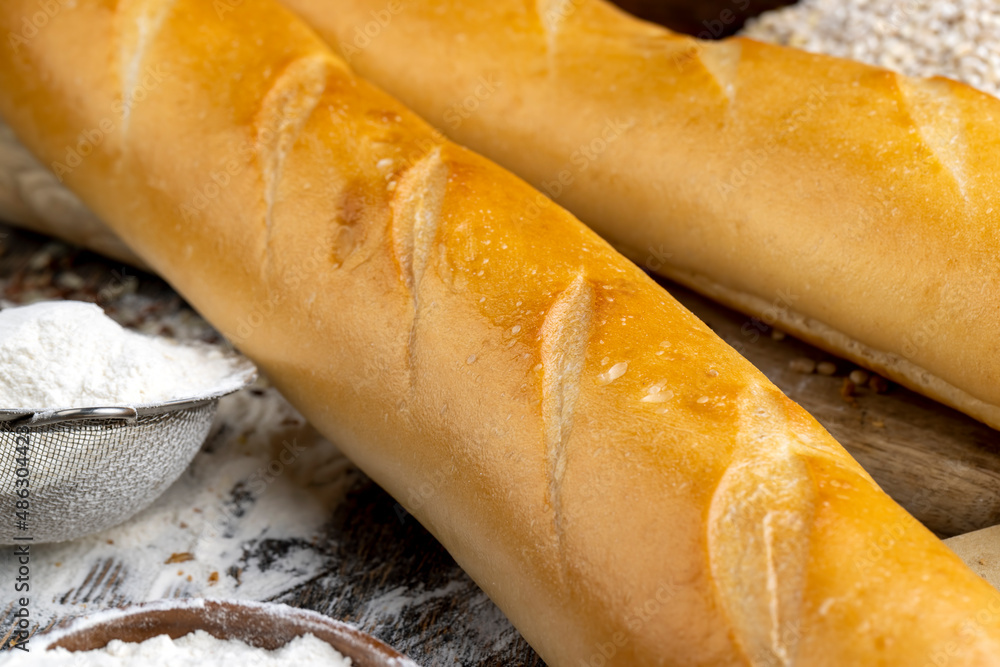 pieces of wheat baguette on a cutting board