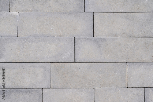Close up, gray brown paving slab texture background.