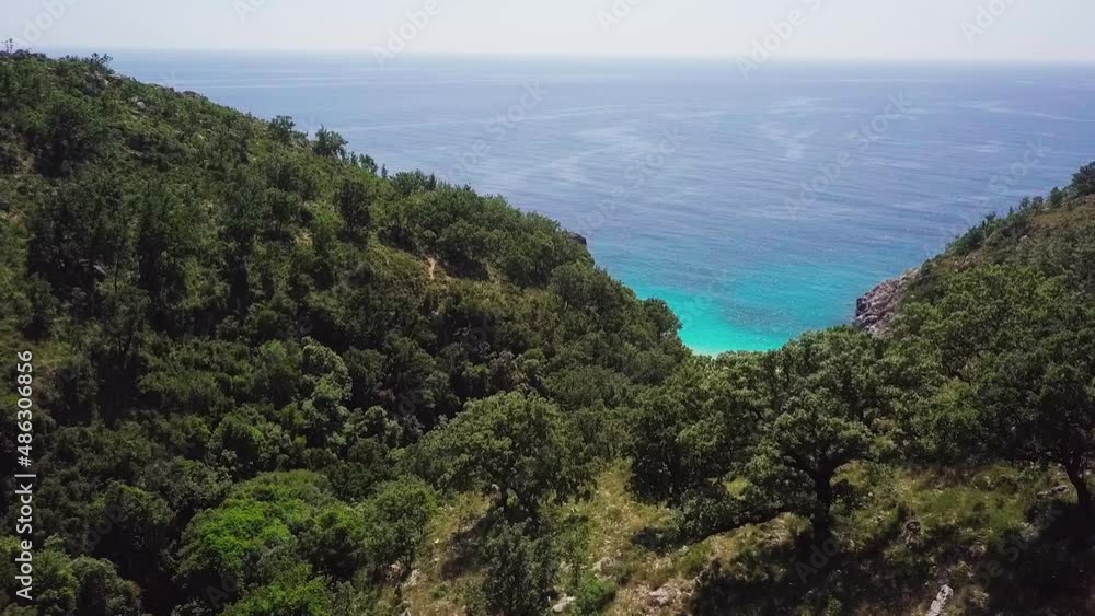 The beautiful Saint Andreas Bay on the Ionian coast of Southern Albania, Europe. Aerial fly over The beautiful Saint Andreas Bay on the Ionian coast of Southern Albania, Europe. Aerial fly over