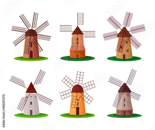 Set of different types of windmills white background. Vector cvintage stone and wooden windmills for grinding wheat grains to flour in flat style.