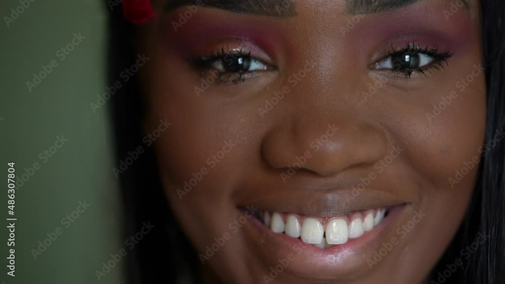 Portrait of a young black woman smiling at camera a teen girl smile Portrait of a young black woman smiling at camera a teen girl smile