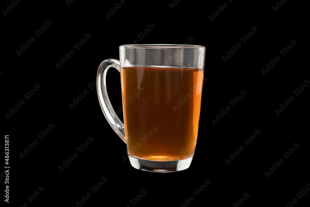 A turkish glass of tea on black background.