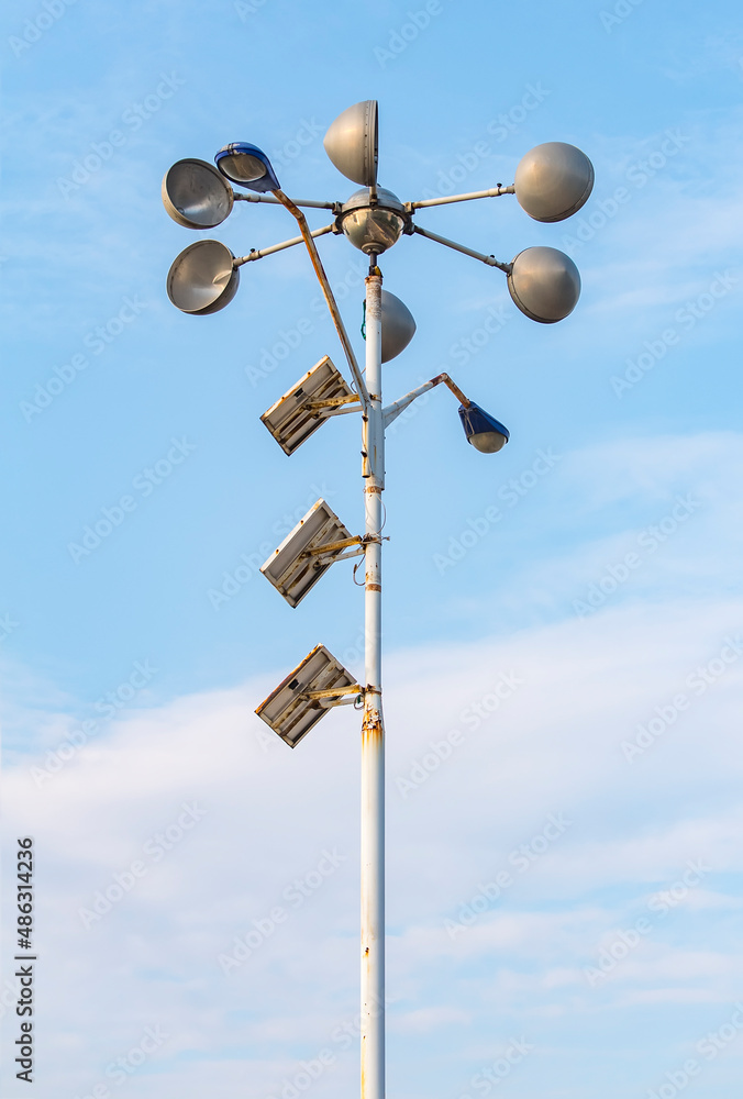weather station with solar panel placed in the field to monitor atmospheric conditions. weather station with solar panel placed in the field to monitor atmospheric conditions.