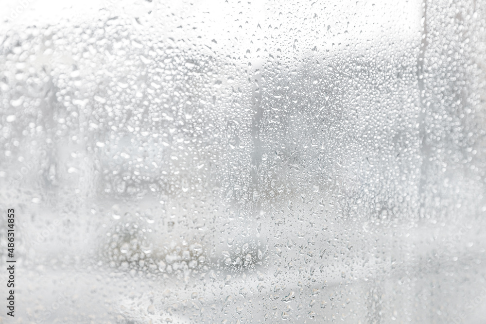 Closeup view of window with rain drops Closeup view of window with rain drops