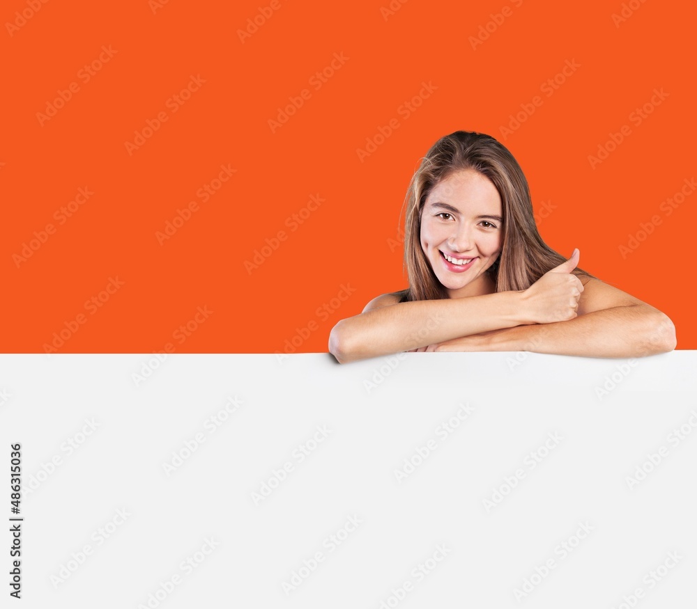 Photo of young woman happy positive with billboard ad advice choice Photo of young woman happy positive with billboard ad advice choice