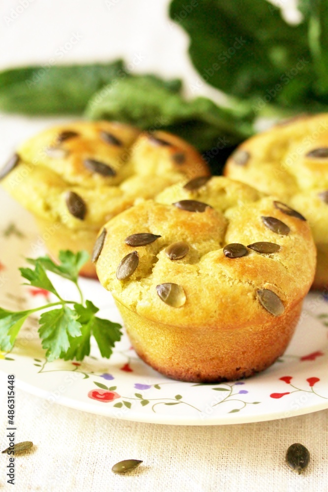 Green muffins with spinach juice with pumpkin seeds. Patrick's Day meals .cupcake spinach