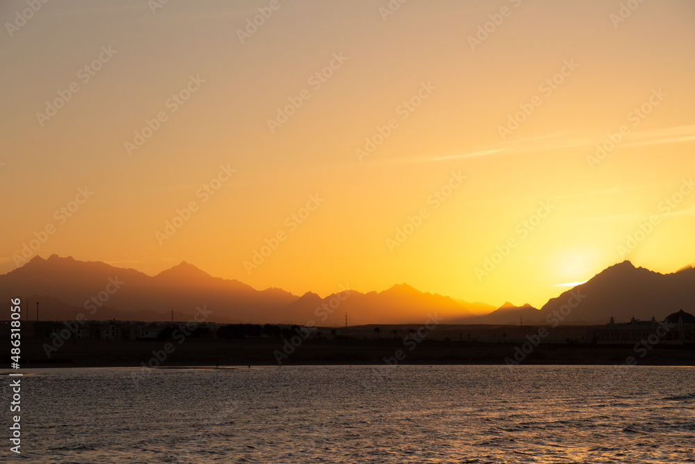 natural background sunset view of the sea, mountains
