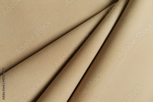 Foto Gold crumpled or wavy fabric texture background