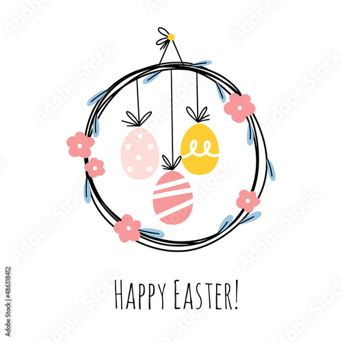 Photography Adorable easter floral wreath decorated with flowers and painted eggs