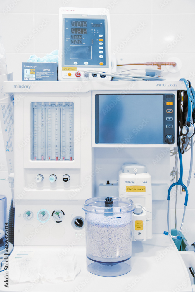 Empty operating room in a hospital. Surgical equipment with operating table. Medical device for emergency patient in blue tone style. Blank Emergency Surgery Room. Clinic interior for background. Empty operating room in a hospital. Surgical equipment with operating table. Medical device for emergency patient in blue tone style. Blank Emergency Surgery Room. Clinic interior for background.