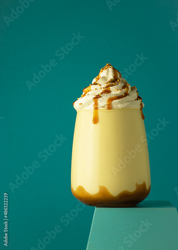 Salted caramel frappe coffee served on glass photo