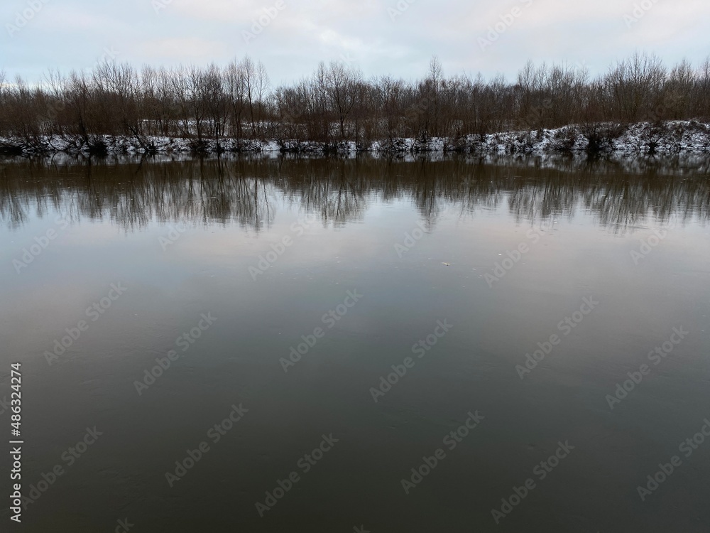 Dark water of the river in winter. Dark water of the river in winter.