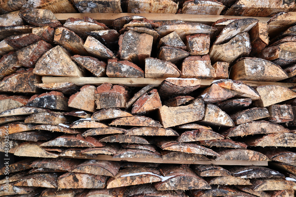 stack of firewood made from old planks close up view stack of firewood made from old planks close up view