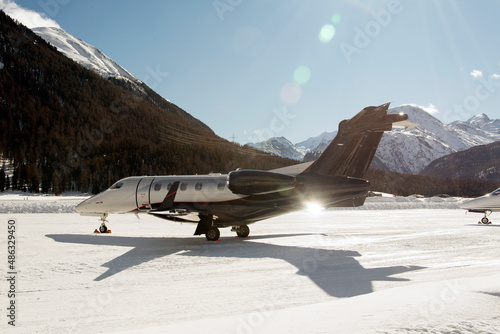 Private jets and aircrafts in the airport of Engadine St Moritz in winter time