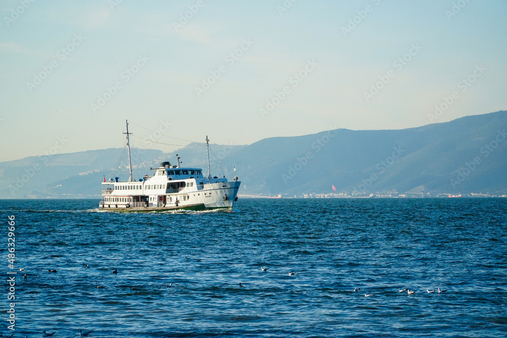 Ferry on the sea. Minimal concept of ferry and the sea. Steamship floating on the sea. Steamship in Istanbul Bosphorus.