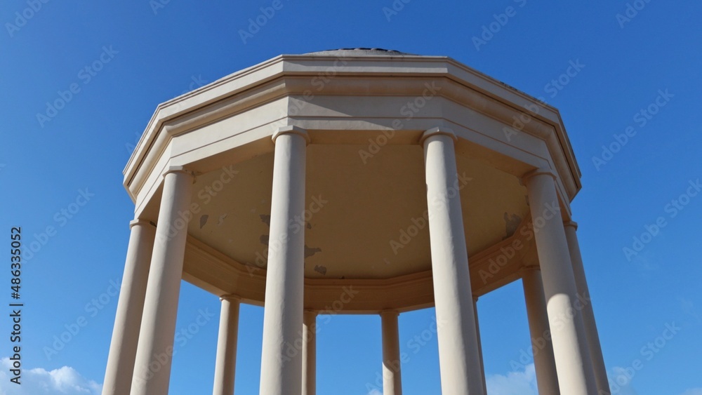 The Gazebo, a round temple with a dome supported by circular columns. The temple is located in the center of the beautiful Mascagni terrace on the seafront of Livorno, Tuscany, Italy.