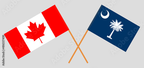 Crossed flags of Canada and The State of South Carolina. Official colors. Correct proportion