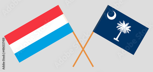 Crossed flags of Luxembourg and The State of South Carolina. Official colors. Correct proportion